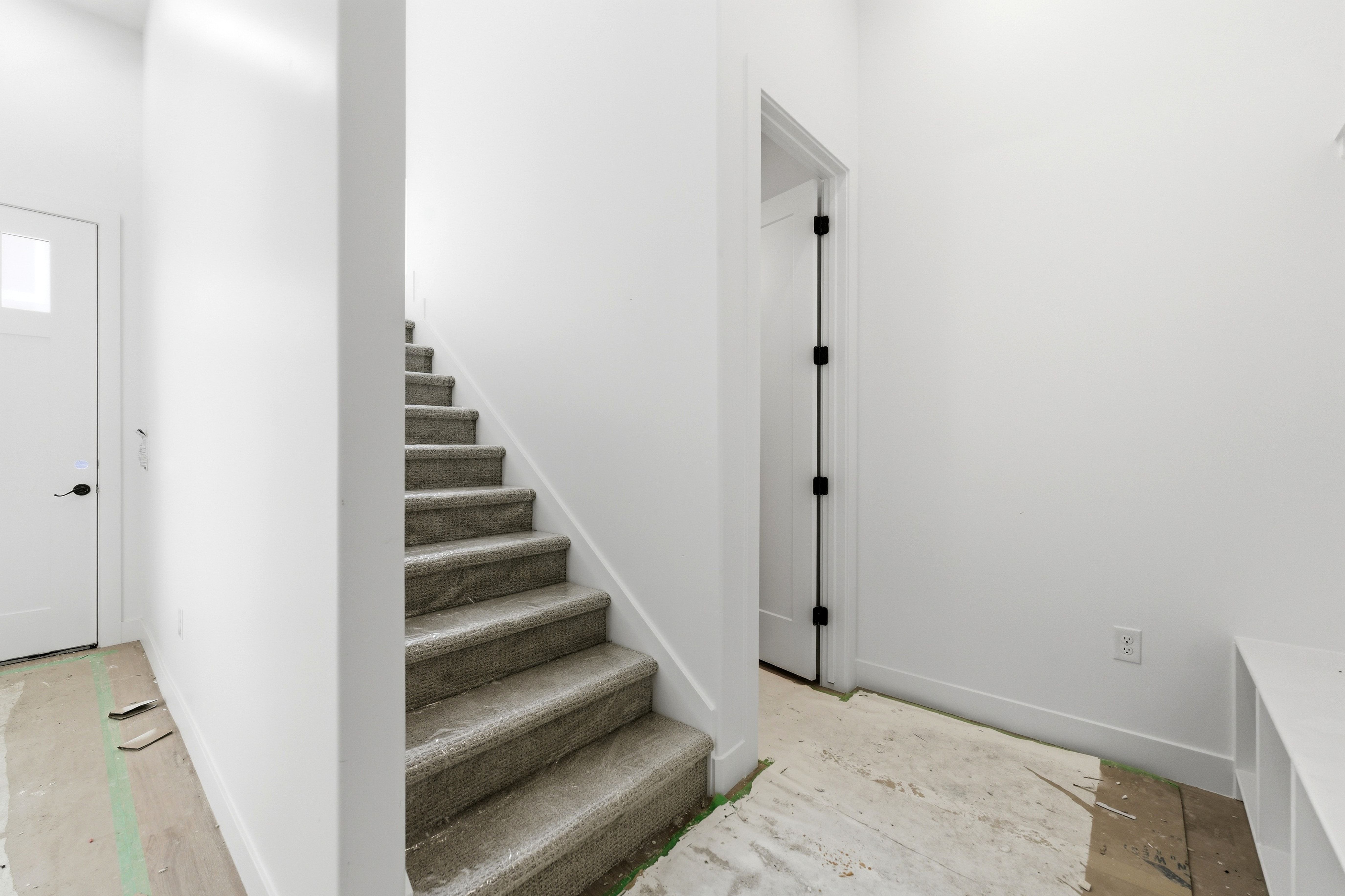 Stairs featuring baseboards