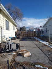 View of yard covered in snow