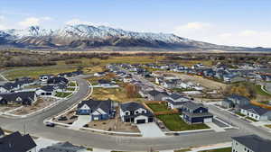Aerial perspective of suburban area featuring mountains