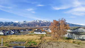 View of mountain background featuring nearby suburban area