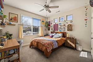 Bedroom featuring carpet floors and a ceiling fan