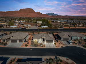 Aerial view at dusk of a residential view and a mountain view