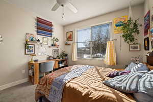 Bedroom with carpet and a ceiling fan