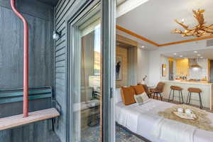 Bedroom with recessed lighting and ornamental molding