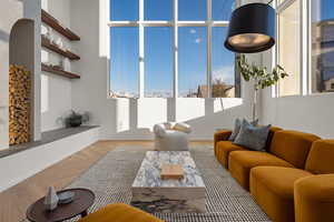 Living area featuring wood finished floors and baseboards