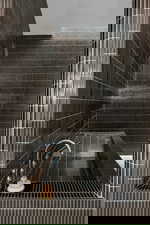 Bathroom featuring a tile shower