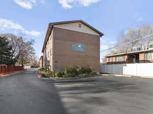 View of side of home with brick siding