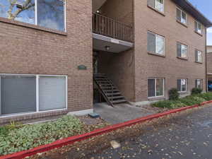 View of apartment building / complex with stairway