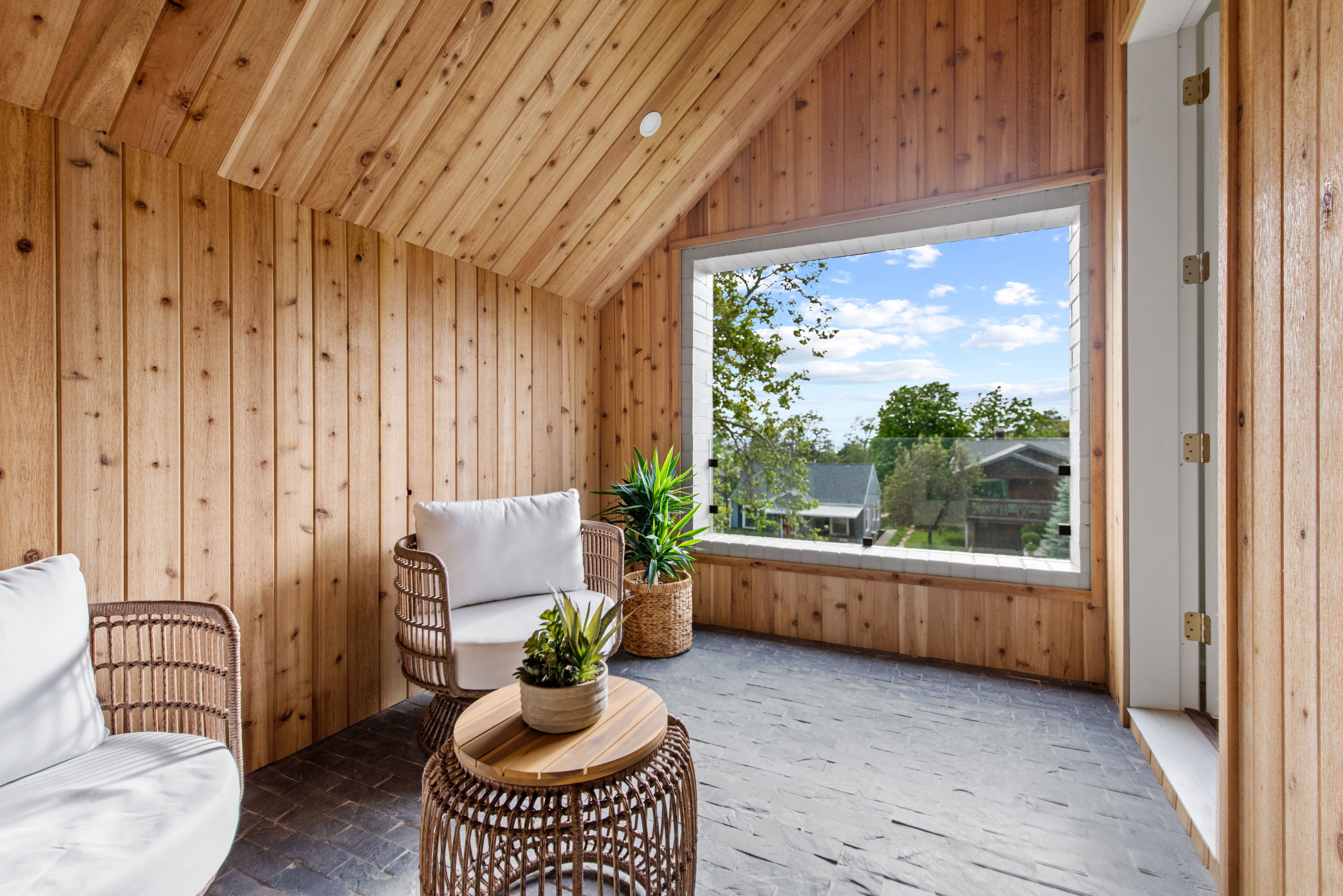 Enclosed sun patio located off of Primary Bedroom