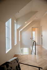 Hallway with view of exit to enclosed sun patio