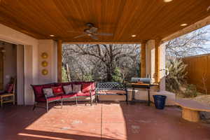 View of patio / terrace with ceiling fan, an outdoor living space, and area for grilling