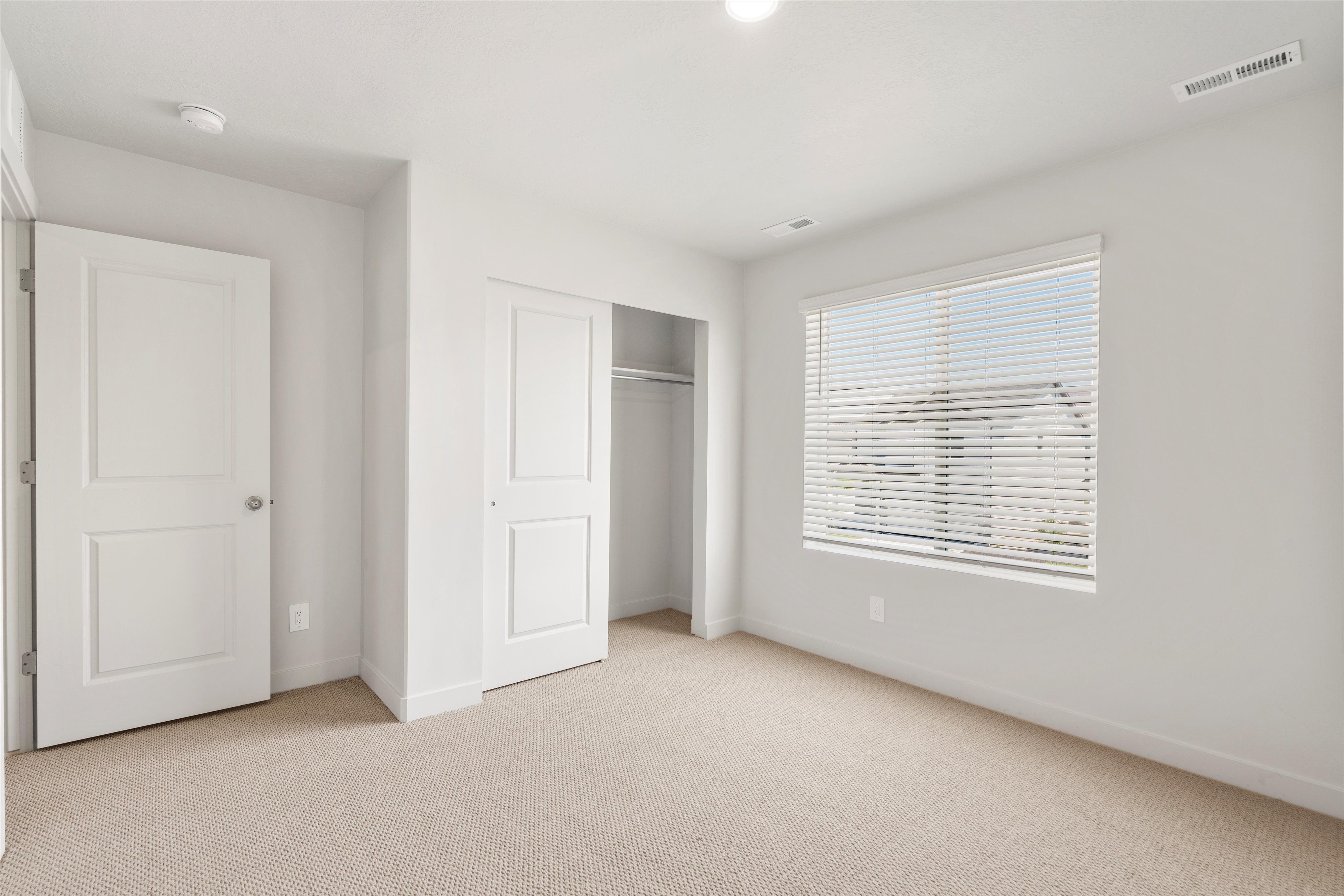 **DISLCAIMER** Exterior & Interior packages may vary.Unfurnished bedroom with carpet flooring and a closet