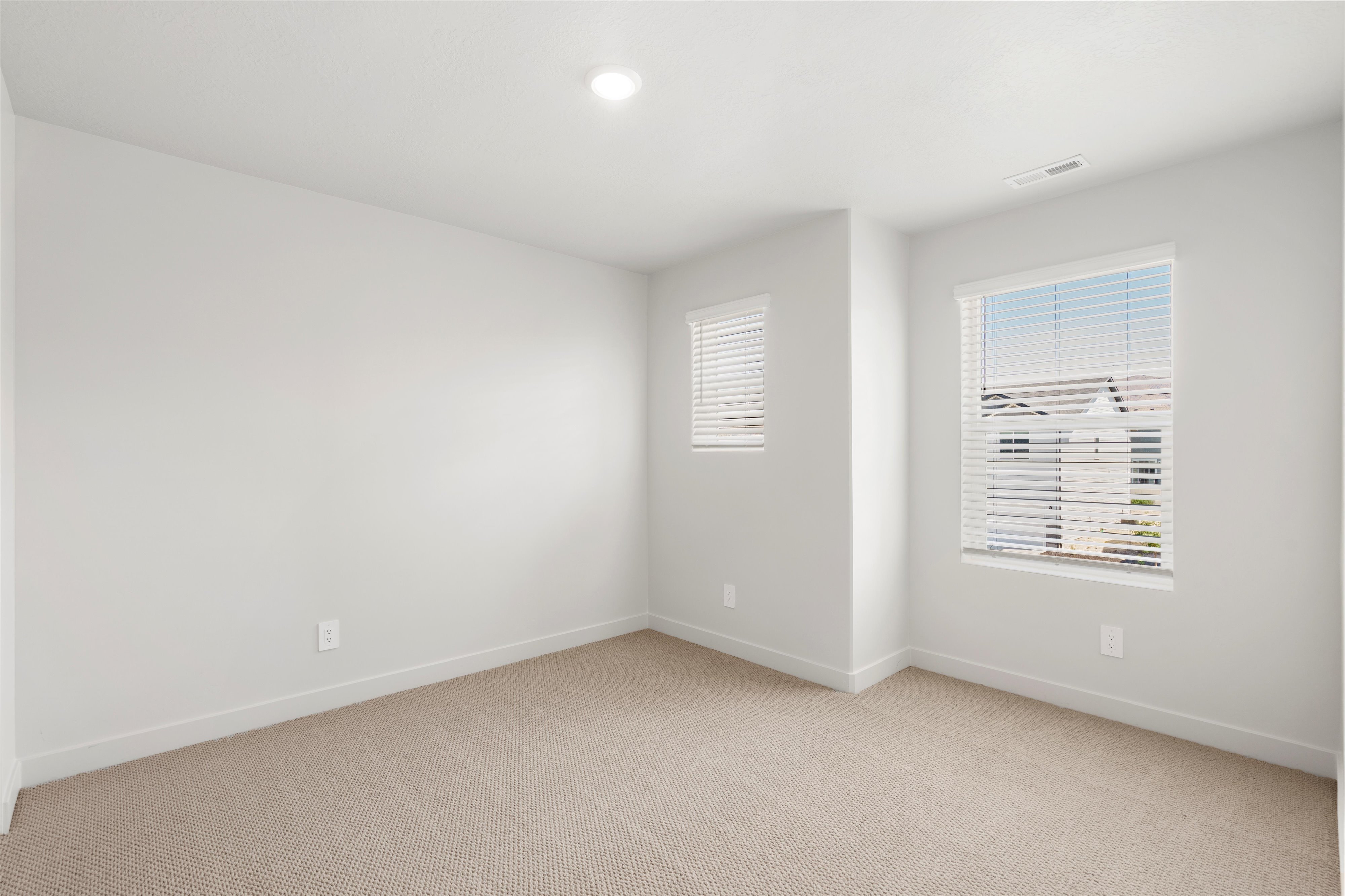 **DISLCAIMER** Exterior & Interior packages may vary.Unfurnished room with light colored carpet and recessed lighting