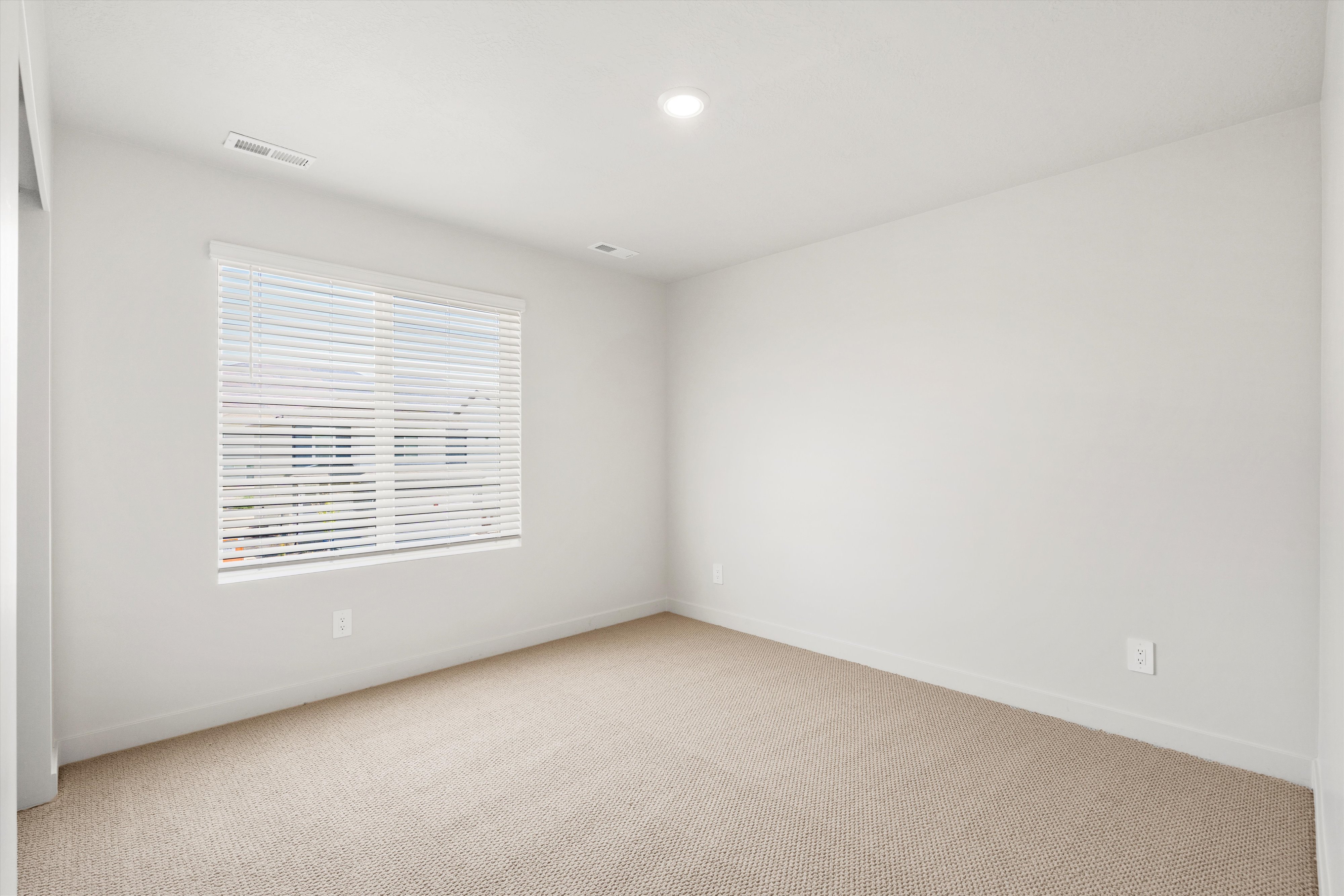 **DISLCAIMER** Exterior & Interior packages may vary.Carpeted empty room with baseboards and recessed lighting