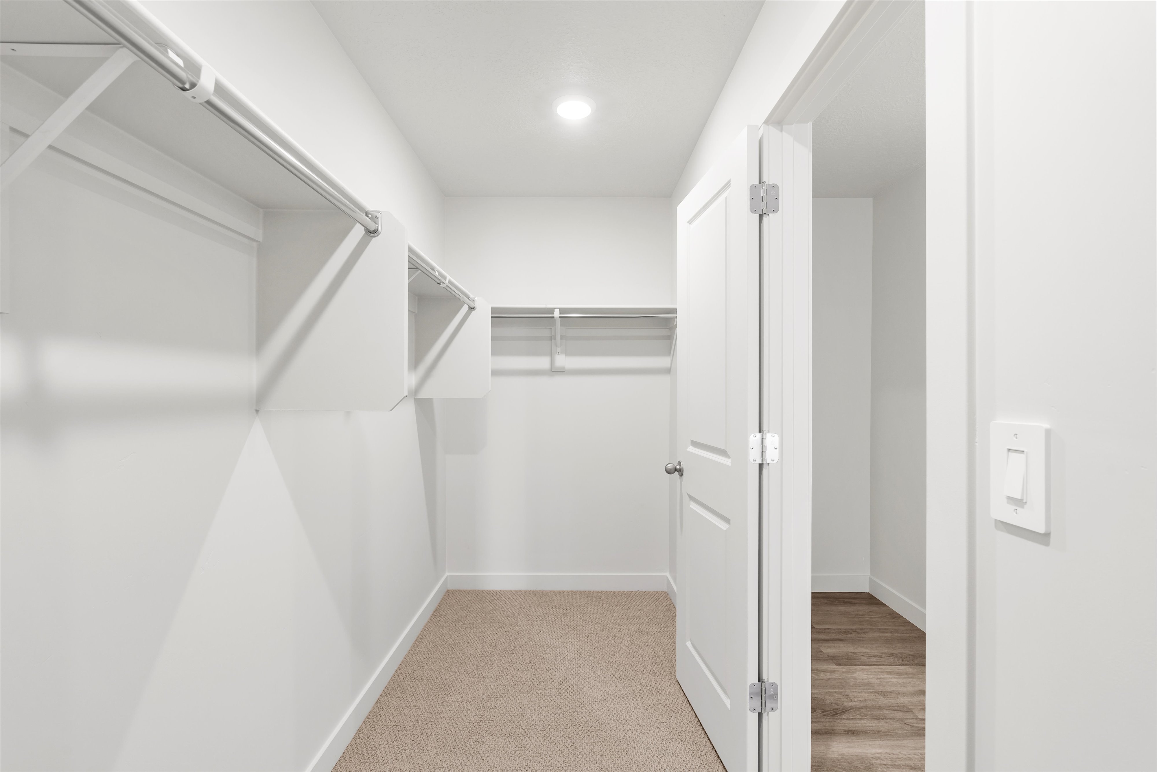 **DISLCAIMER** Exterior & Interior packages may vary.Spacious closet featuring light carpet