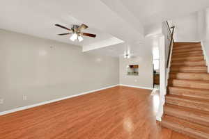 Laminate floors with tile floors in the kitchen. View from the entry door.