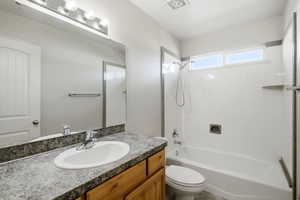 Full bathroom featuring bathtub / shower combination and vanity
