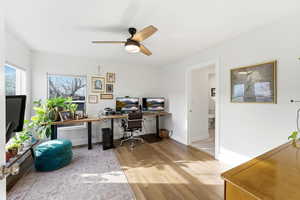 Office featuring light wood finished floors and a ceiling fan