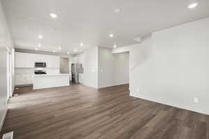 Unfurnished living room featuring recessed lighting and light wood finished floors