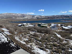 Snowy aerial view with a mountain view