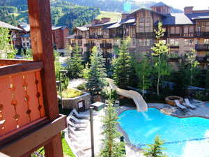 Community pool with a water slide