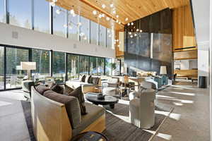 Common area featuring wooden ceiling and a towering ceiling