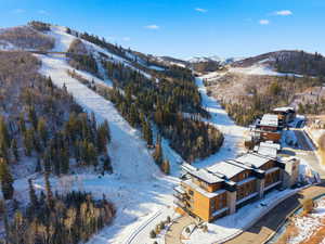 Snowy aerial view with a mountain view