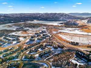 Snowy aerial view with a mountain view