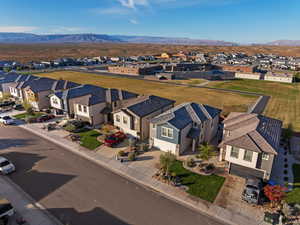 Aerial view of residential area with a mountainous background