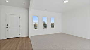 Spare room featuring recessed lighting and light wood-type flooring