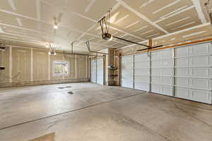 Garage with a garage door opener & extra insulation