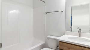 Full bathroom with vanity and tub / shower combination