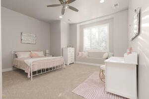 Bedroom with carpet floors, a ceiling fan, and recessed lighting