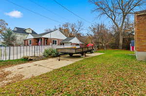 View of yard with a wooden deck