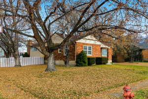 View of front facade featuring brick siding