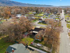 Aerial perspective of suburban area with a mountain backdrop