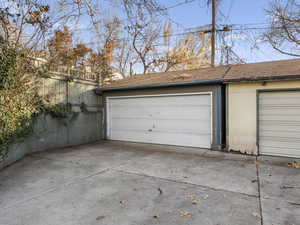 View of detached garage, left side. Neighbor is the right side garage.