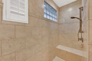 Bathroom with tiled shower