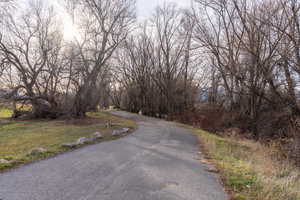 The wide two lane paved pathway facilitates cycling, for River Crossing Residents.