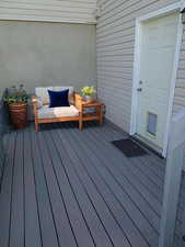 Wooden terrace with outdoor lounge area