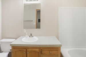 Bathroom with a bathtub and vanity