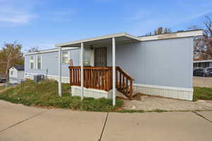 View of front of home featuring covered porch