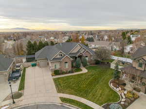 Aerial view at dusk of a residential view and a mountain view