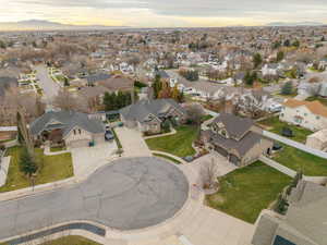 Aerial view at dusk of a residential view and a mountain view