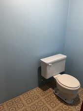 Bathroom with latrine only.