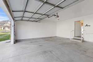 Garage featuring a mountain view