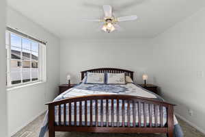 Bedroom featuring baseboards and a ceiling fan