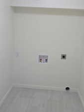 Washroom with electric dryer hookup and hookup for a washing machine