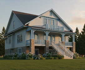 View of front of property with stairs, a porch, and a front lawn