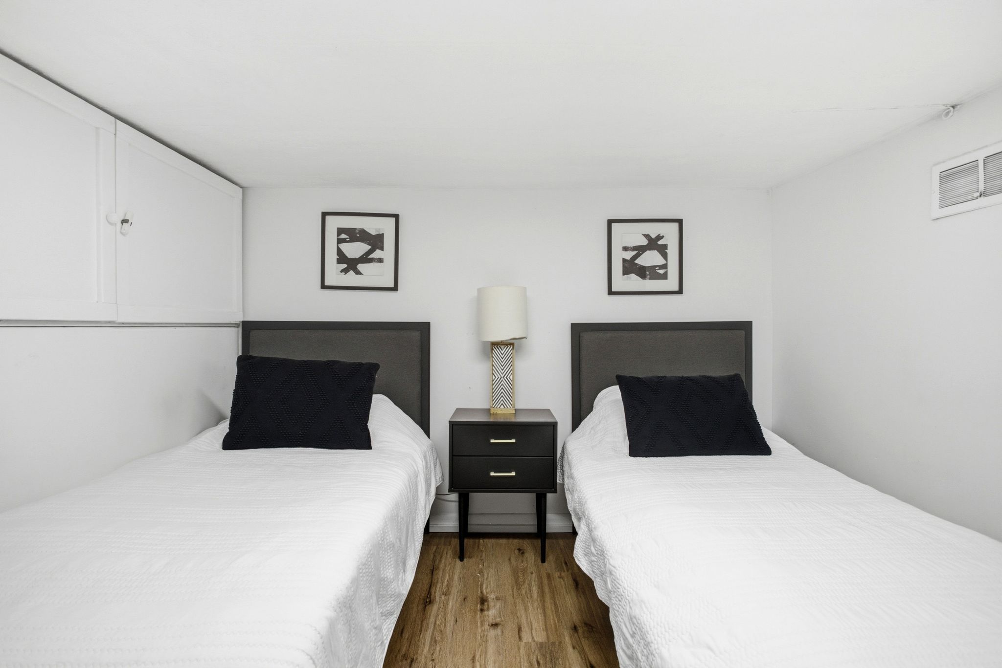 Bedroom with wood finished floors
